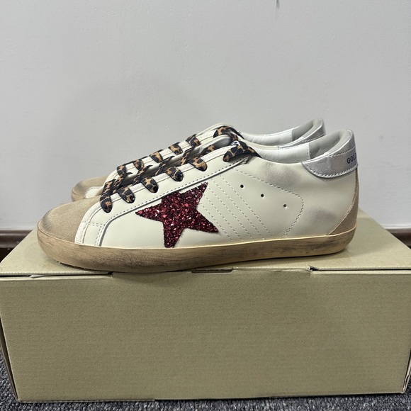 Golden Goose Shoes - Golden Goose White Sneakers with Red Star Accent